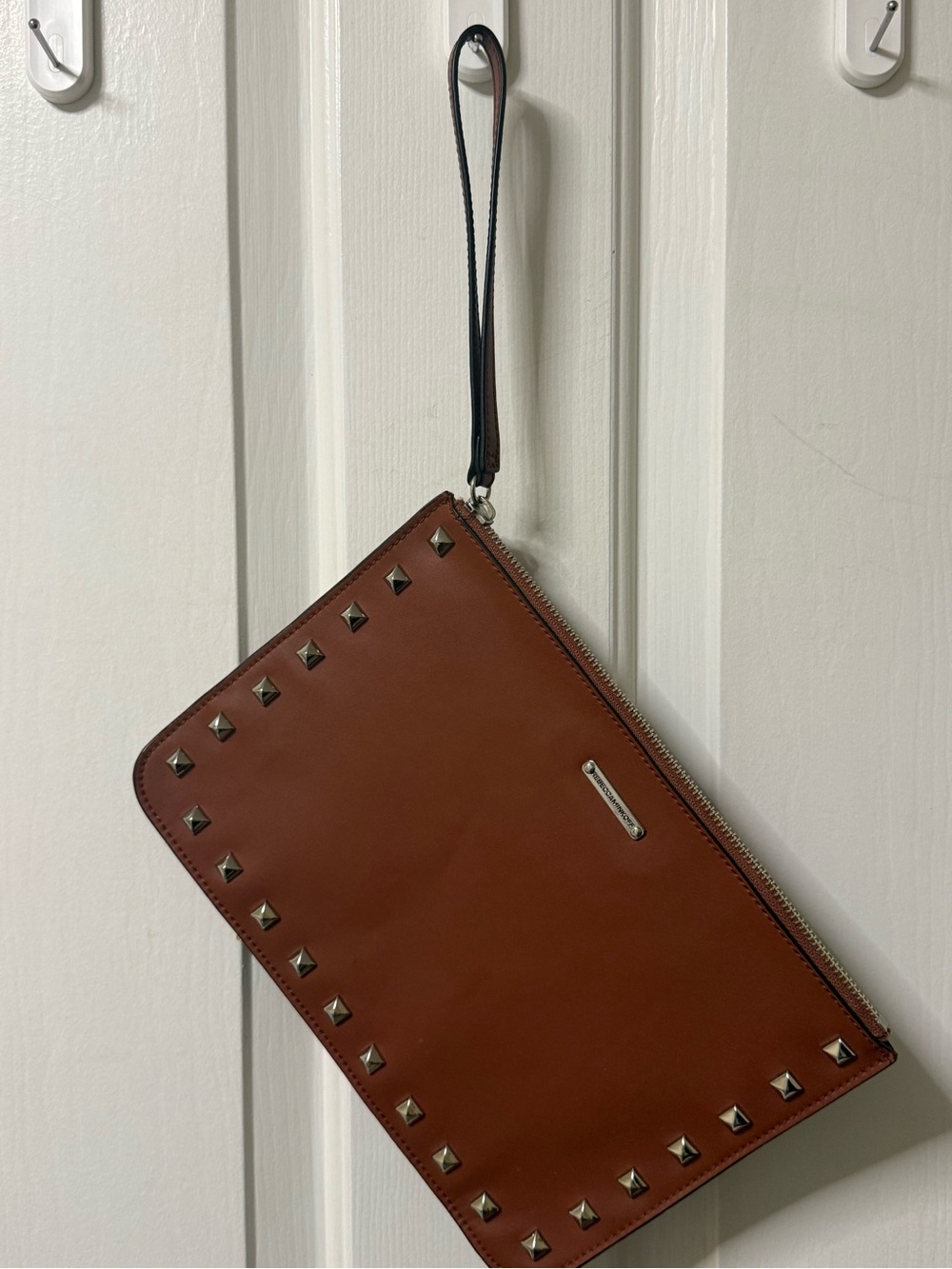 Rebecca Minkoff Rust Leather Zip Wristlet with Gold Plaque